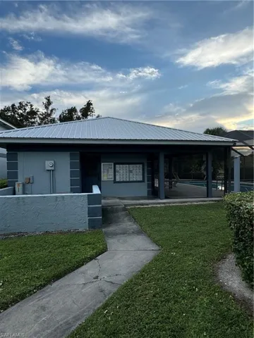 Mail boxes - View of property's community with a yard