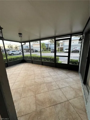 Unfurnished sunroom with a healthy amount of sunlight