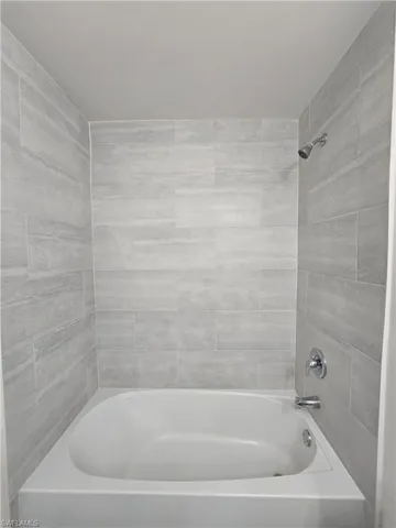 Full bathroom featuring tub / shower combination