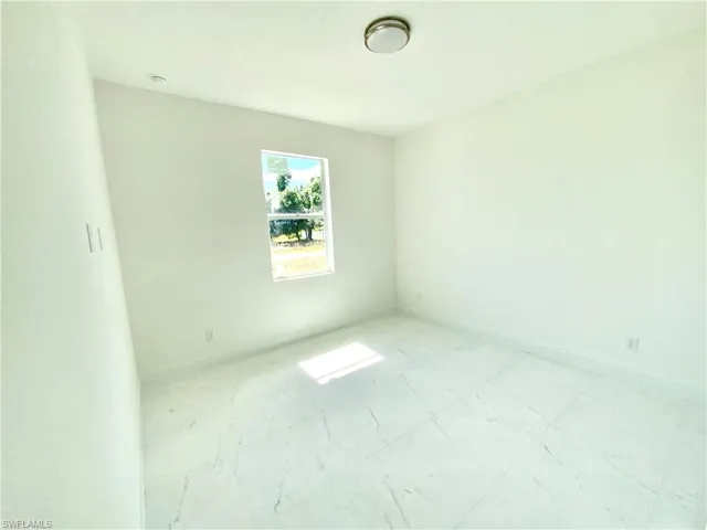 View of tiled empty room