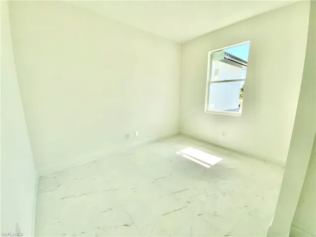 View of tiled empty room