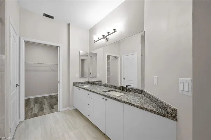 Double sinks and walk-in closet