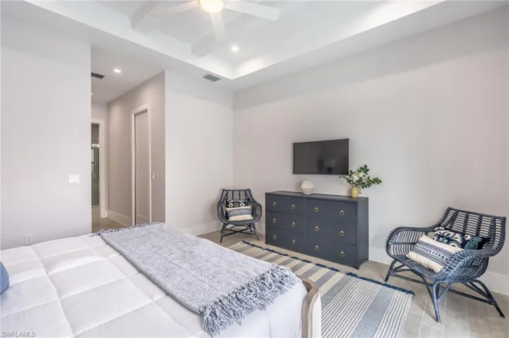 Bedroom featuring a closet, recessed lighting, and a ceiling fan