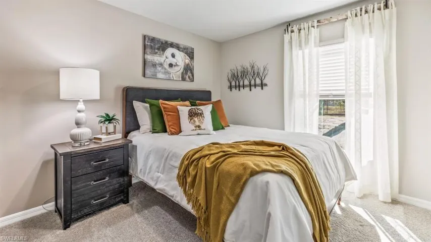 Bedroom featuring carpet