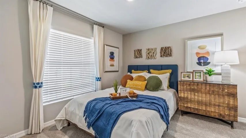 Bedroom with carpet