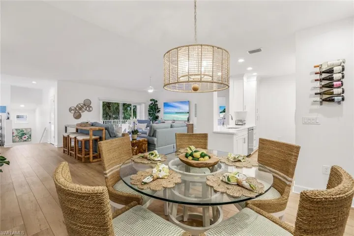 Dining area with recessed lighting and a chandelier
