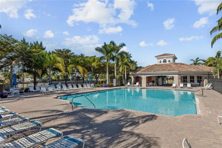 Community pool with a patio area