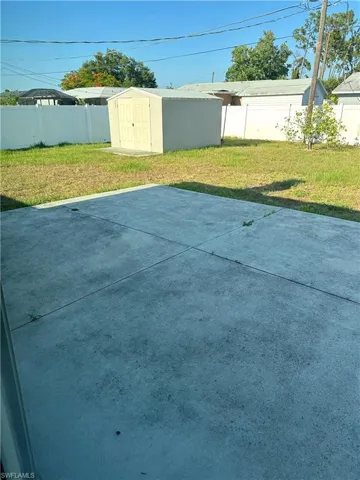View of patio / terrace with a storage shed