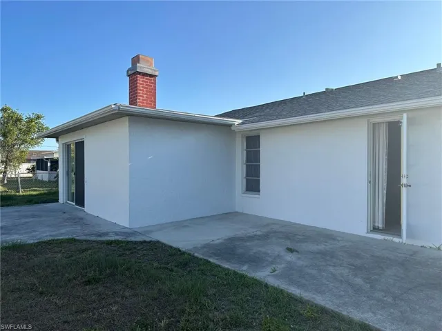 View of home's exterior with a patio