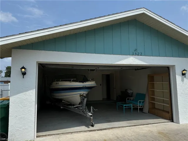 View of garage - Boat is available for purchase outside closing.