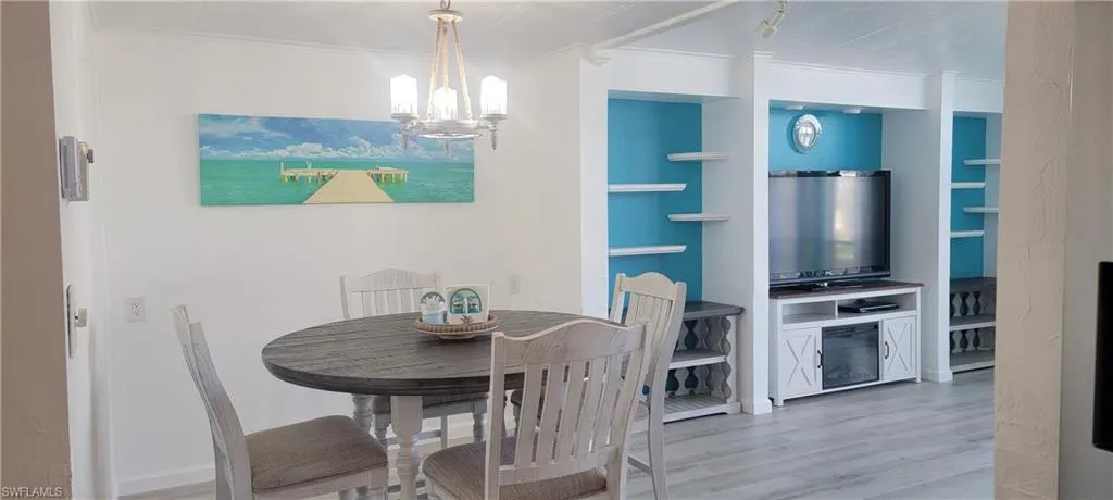Dining space opens to the living room with natural light