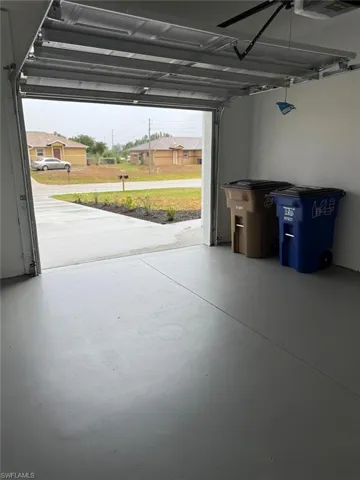Garage featuring ceiling fan