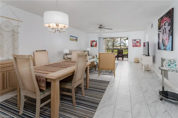 Dining area featuring notable chandelier