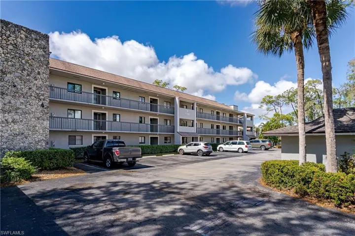 View of building exterior and parking lot