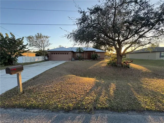 Single story home with a garage