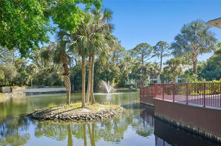 View of home's community with a water view