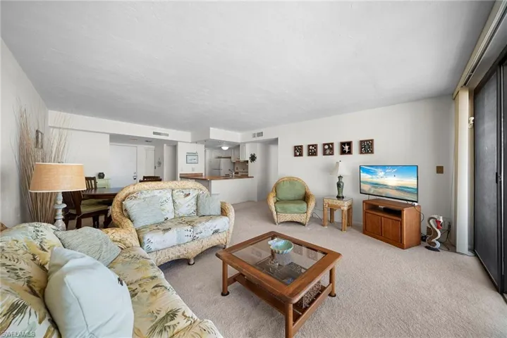 Living area featuring carpet flooring