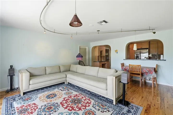 Hardwood flooring throughout the living and dining areas