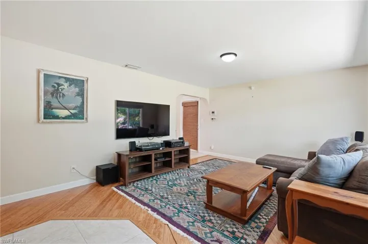 Light-toned walls complement wood-finish flooring
