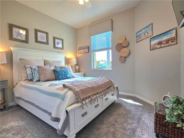 Bedroom with carpet floors and ceiling fan