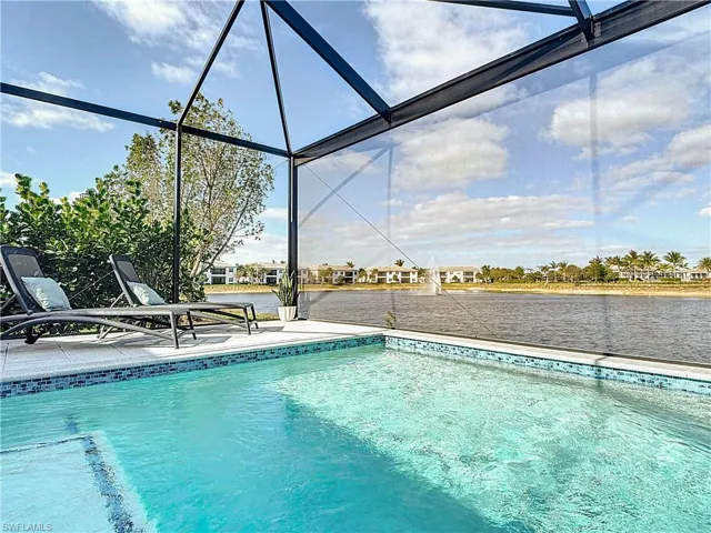 Pool featuring beautiful lake views.
