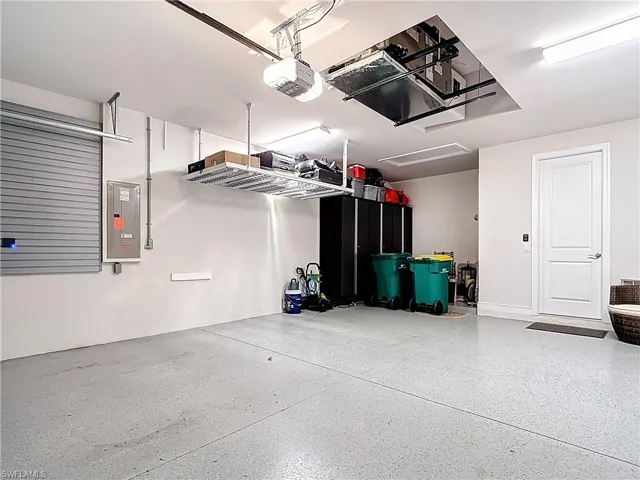 Expanded garage with storage alcove.