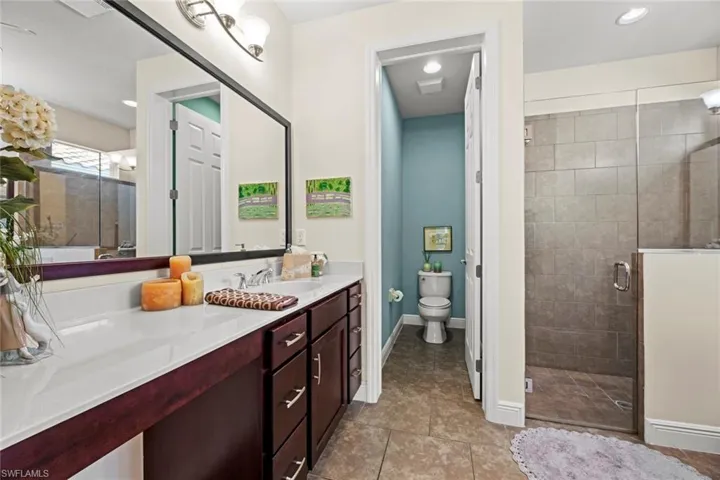 Master bath has large walk-in shower, private water closest