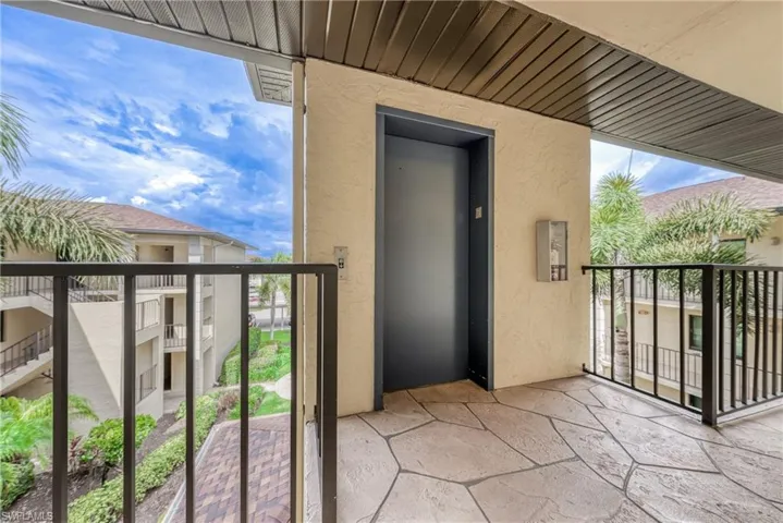 Balcony featuring elevator