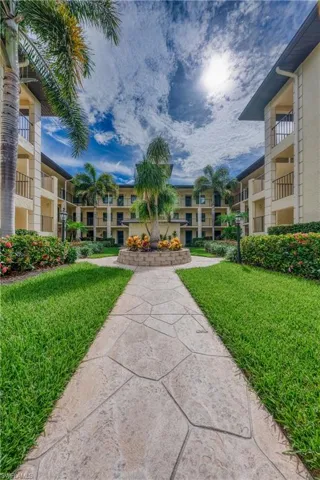 View of nearby features with a lawn