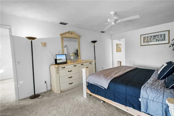 Large main bedrrom has a private bath, large walk-in closet and opens to the coverd lania.