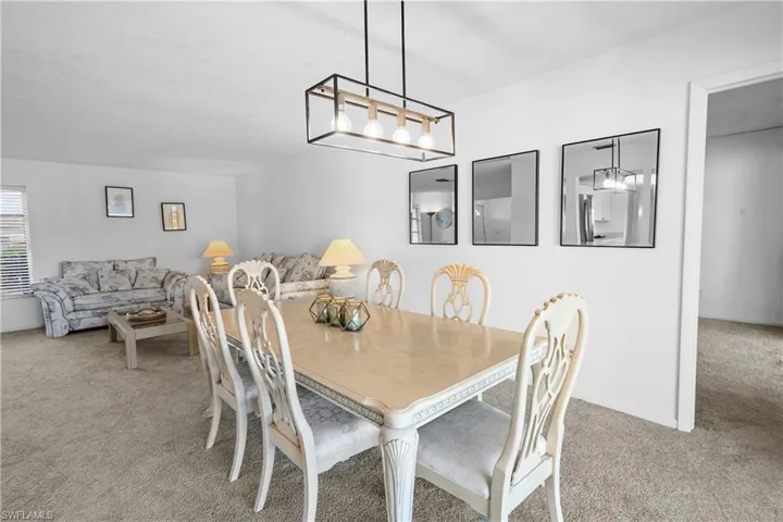Dining room opens to the living room. Main bedroom enterance is off the dinning room.