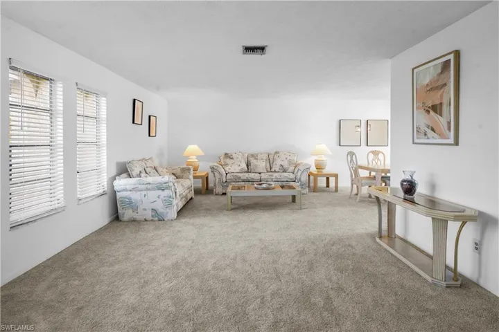 Large L-shaped living room and dinning area.