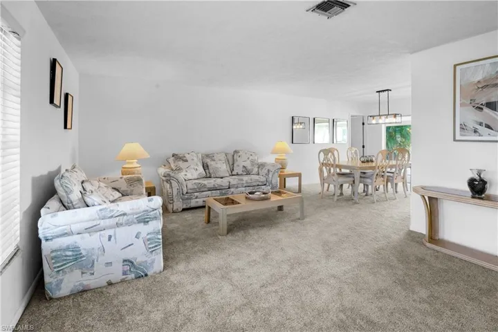 Dinning room opens to the covered lania.
