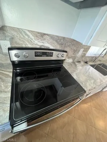 Details with black electric range oven