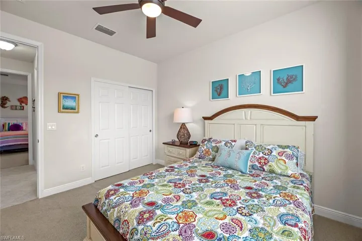 Guest bedrooms both have hall access to guest bath