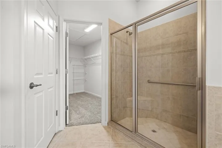 Bathroom featuring large walk-in shower
