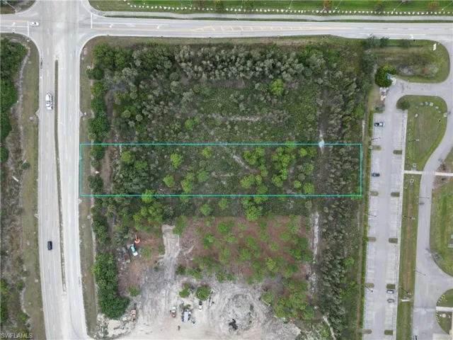 Aerial view of property's location featuring property parcel outlined