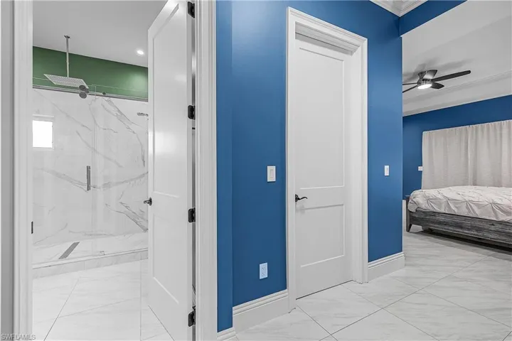 Primary bedroom and bathroom