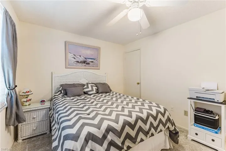 Bedroom featuring carpet floors and a ceiling fan