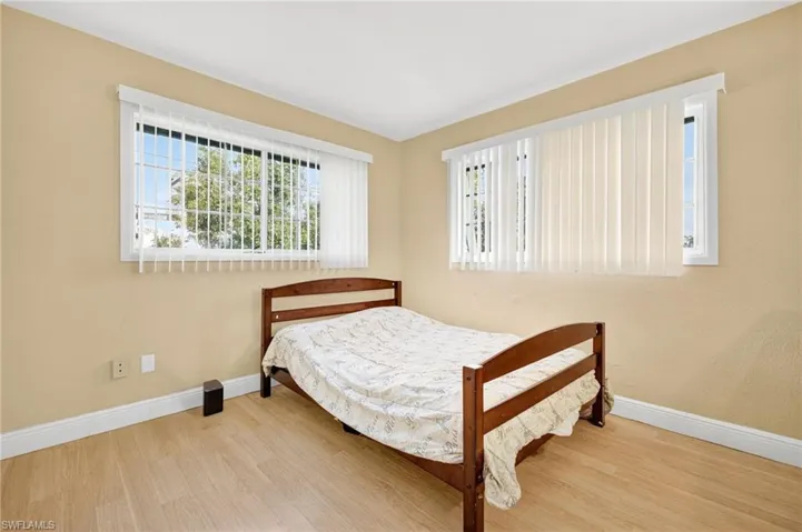Bedroom featuring wood finished floors