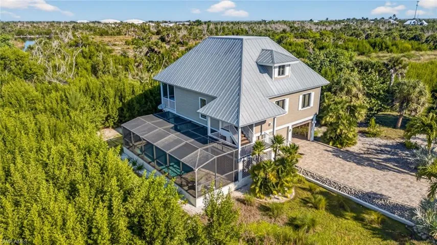 Aerial view of property and surrounding area