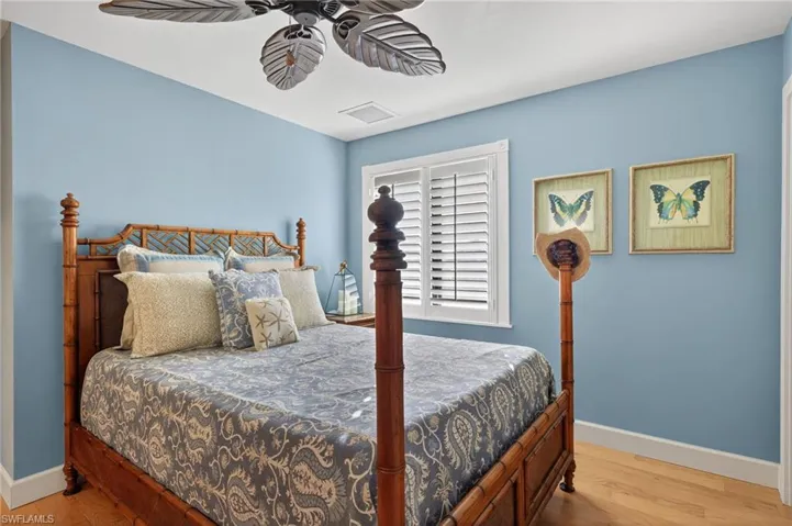 Bedroom featuring light wood-type flooring and ceiling fan