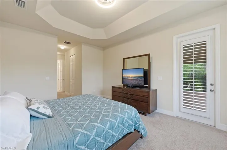 Master bedroom opens to the pool