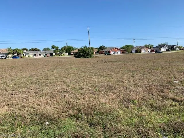 703 SE 8th  ST, Cape Coral, FL 33990