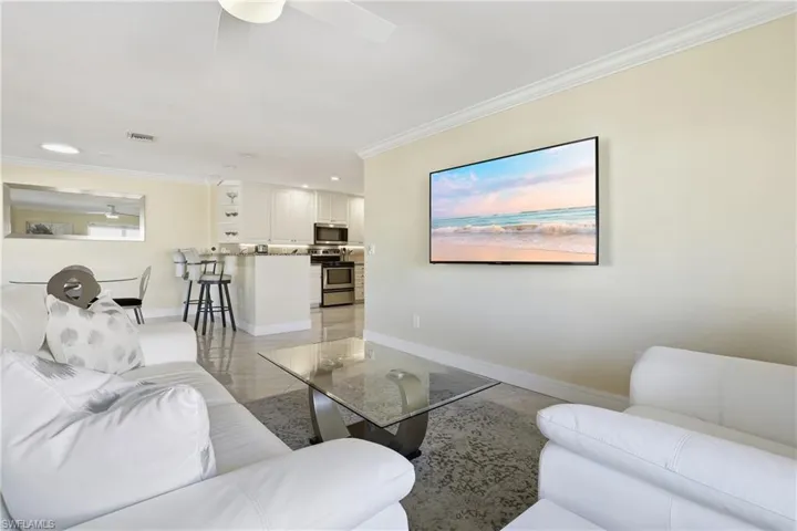 Open concept and a fresh clean look throughout this remodeled unit