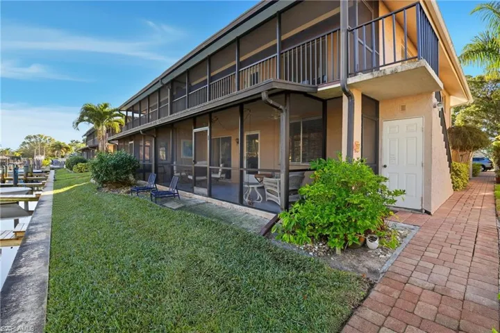 View of the second floor property with the private screened lanai