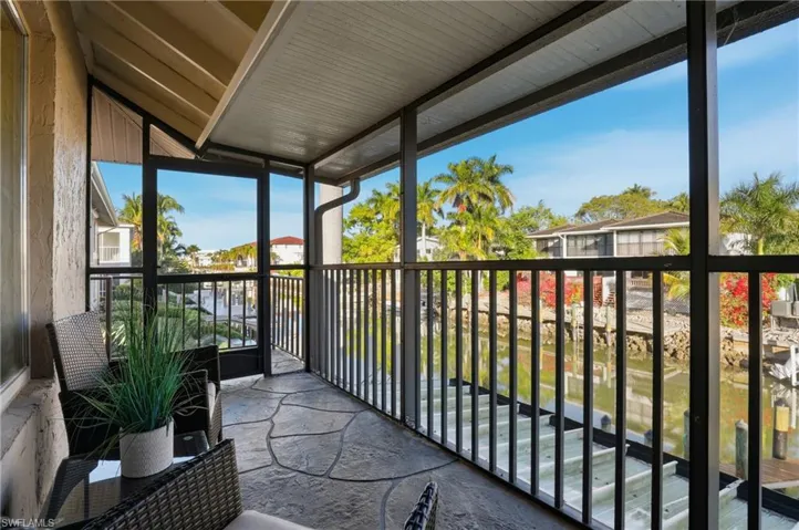The screened lanai offers relaxing water views and endless sunsets