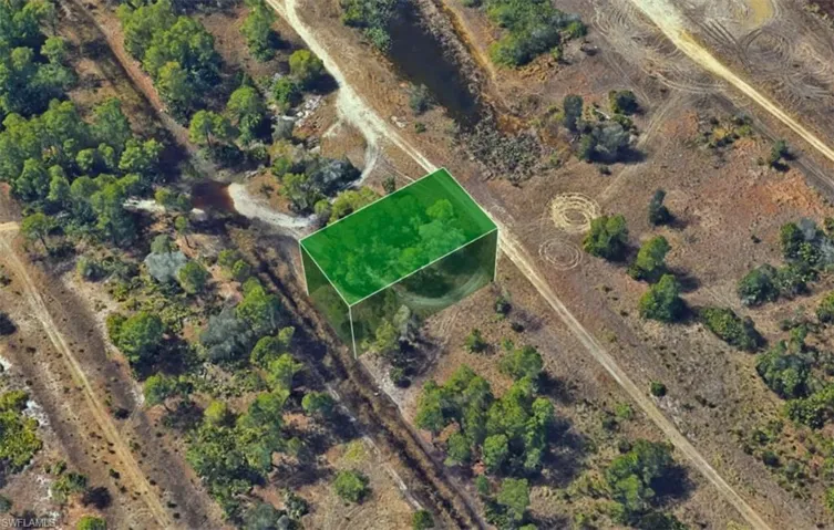 View of property location with property parcel outlined and rural landscape