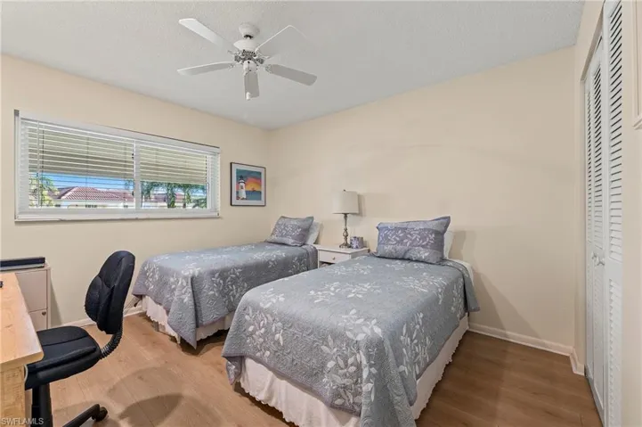 The guest bedroom can easily accommodate guests and has room for a desk, computer and more!