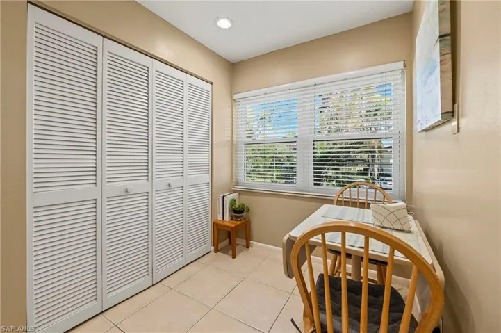 A nice table for two is the perfect breakfast spot, and the washer and dryer are just behind the bi fold doors.